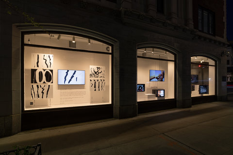 Installation of three windows at night. 